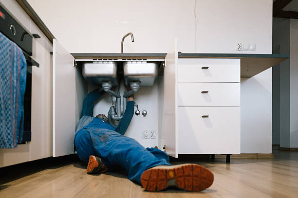 Professional Emergency Plumber technician working in Colfax, IA
